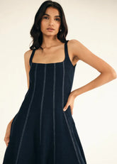 A Model Wearing Blue Denim Blue Denim Midi Dress, curated by Only Ethikal